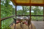 Woodsong -  Screened outdoor dining area 